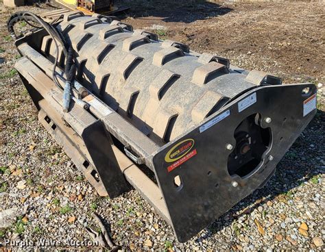 skid steer roller packer|skid steer padfoot roller.